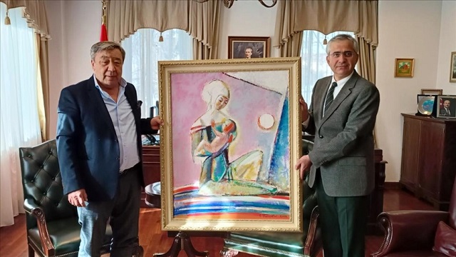 kazak-ressam-tablosunu-satarak-turkiye-deki-depremzedeler-icin-bagis-yapti